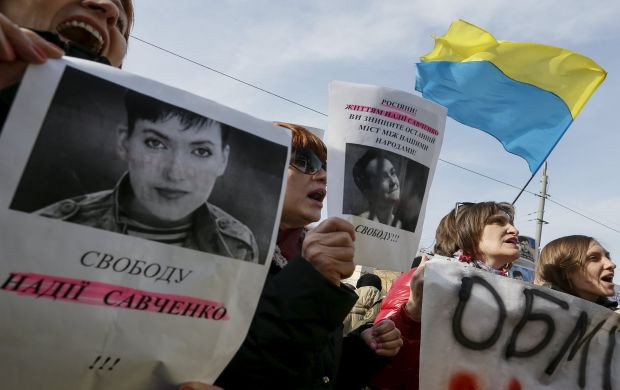 People take part in a rally demanding the liberation of Ukrainian army pilot Nadezhda Savchenko by Russia, near the Russian embassy in Kiev, Ukraine