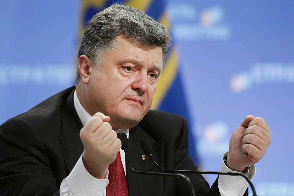 Ukraine's President Petro Poroshenko speaks to the media during a news conference in Kiev