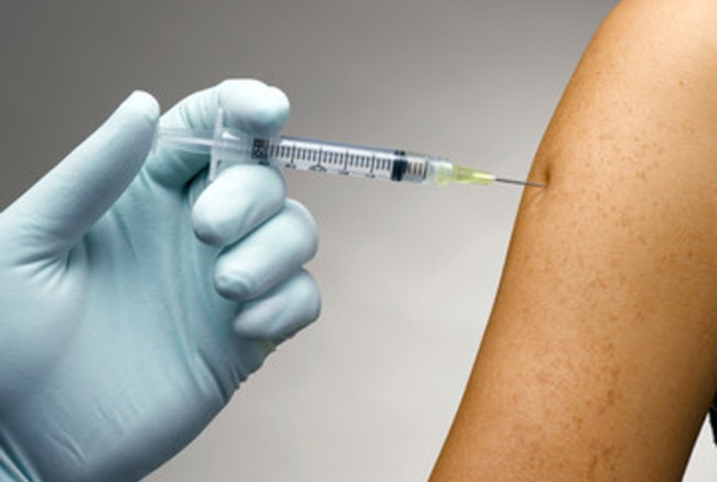 Person receiving a vaccine